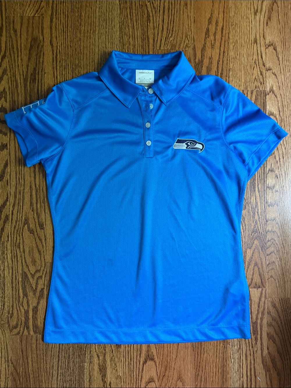 Nike Blue Women's Golf Polo with Embroidered Seahawk Logo